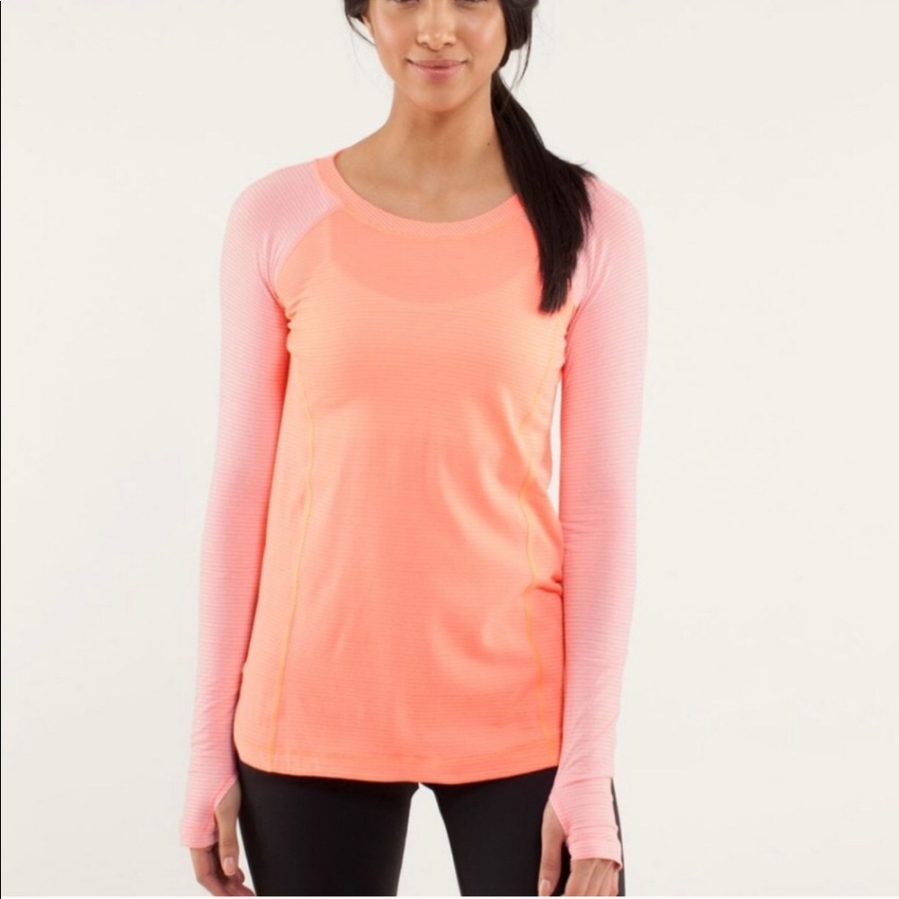 Lululemon Pink/Peach long sleeved running shirt.